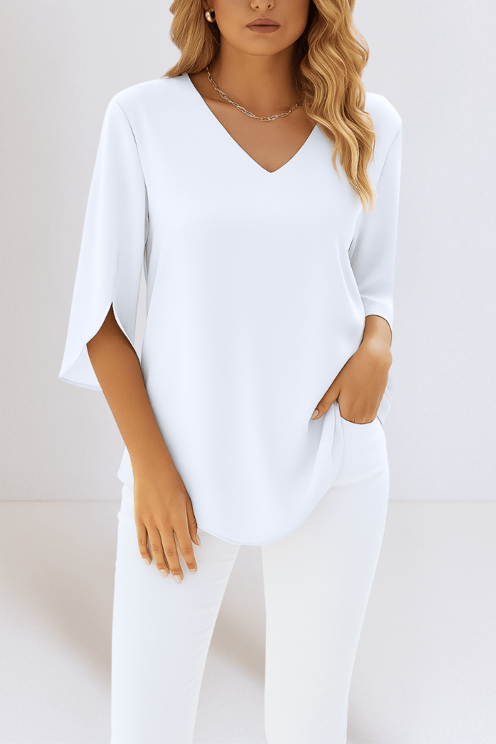 Top elegante con scollo a V e maniche aperte