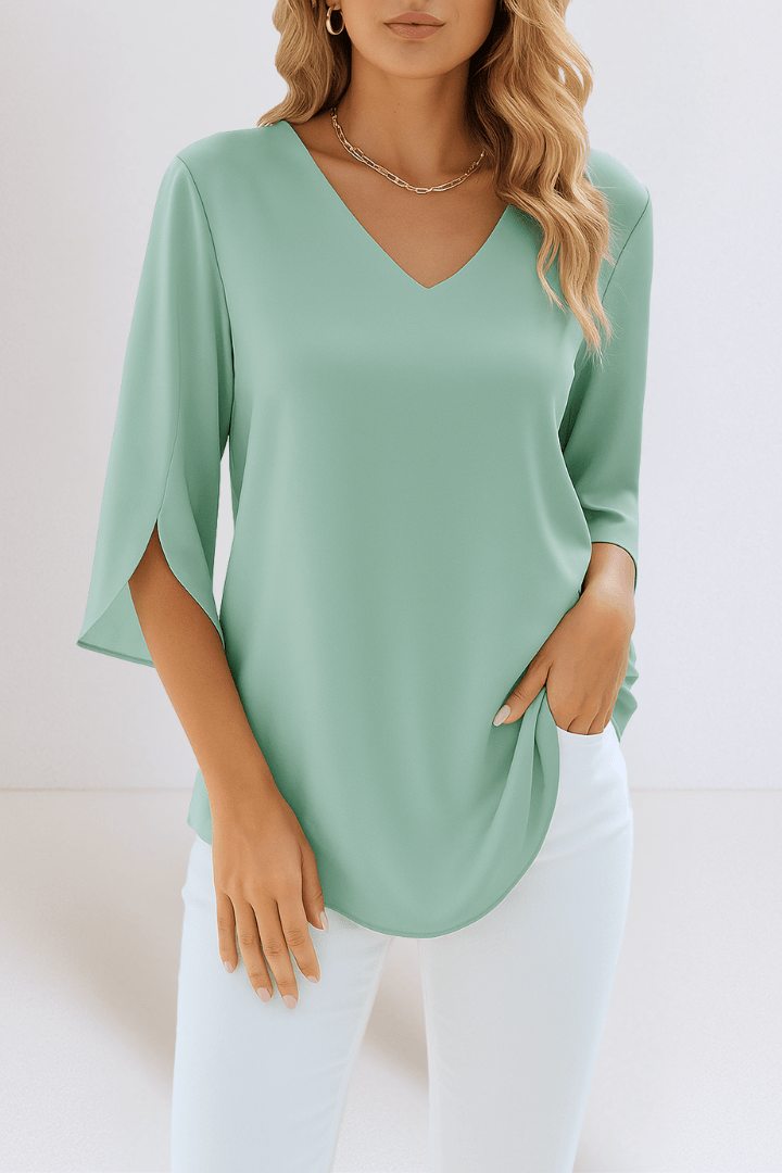 Top elegante con scollo a V e maniche aperte