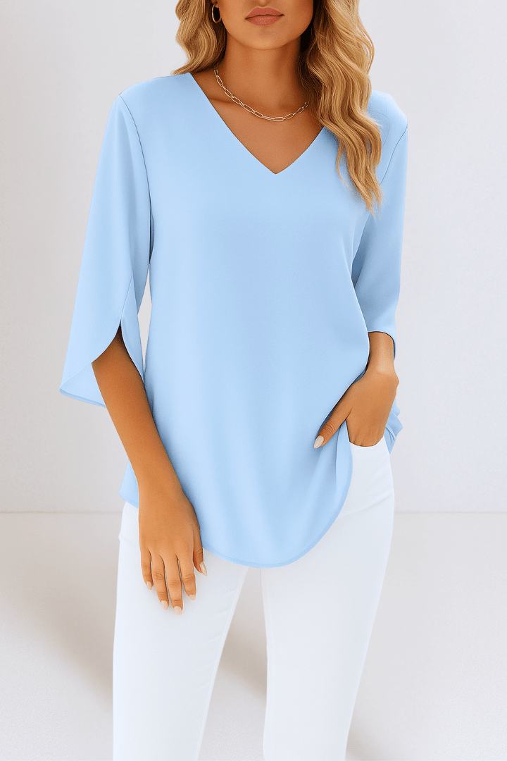 Top elegante con scollo a V e maniche aperte